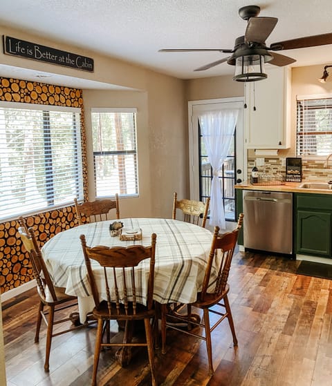 Wood round feature wall in the kitchen.