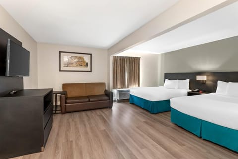 Suite, 2 Queen Beds, Non Smoking (Efficiency) | Desk, blackout drapes, iron/ironing board, free WiFi