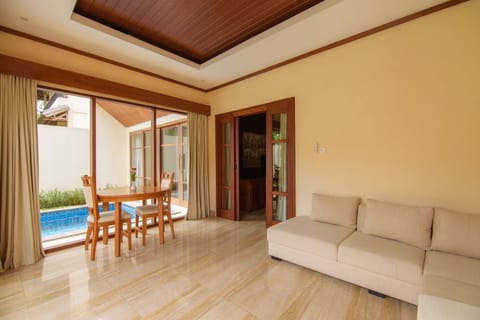 One Bedroom Private Pool Villa | Living area | 42-inch LED TV with digital channels, TV