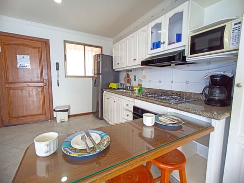 Comfort Apartment | Private kitchen | Full-size fridge, dishwasher, blender, cookware/dishes/utensils