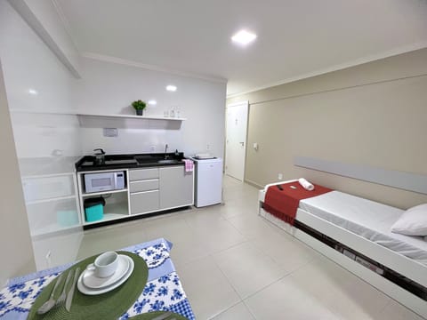 Standard Studio Suite | Private kitchen | Mini-fridge, microwave, stovetop, cookware/dishes/utensils