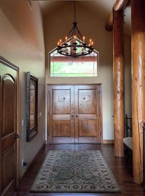 A welcoming foyer and breathtaking views from the adjoining living room windows