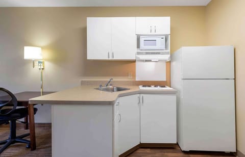 Studio, 1 King Bed, Non Smoking | Private kitchen | Full-size fridge, microwave, stovetop, coffee/tea maker