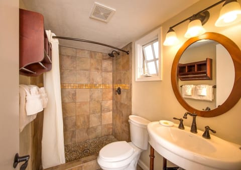 Deluxe Room, 2 Queen Beds | Bathroom | Designer toiletries, hair dryer, towels