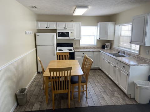 Family Cottage, 2 Bedrooms, Non Smoking, Patio | Private kitchen | Full-size fridge, microwave, oven, stovetop