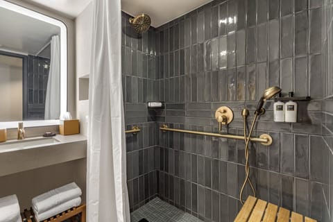 Combined shower/tub, eco-friendly toiletries, hair dryer, bathrobes