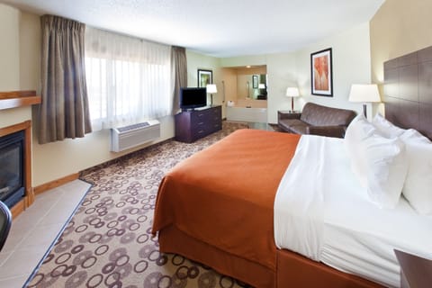 Studio Suite, 1 King Bed, Non Smoking, Fireplace (Hot Tub) | In-room safe, individually decorated, individually furnished, desk