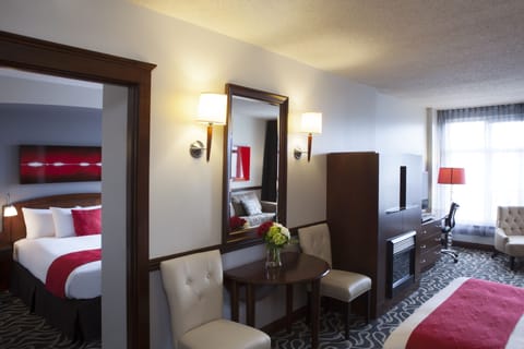Suite, 2 Queen Beds, Courtyard View (Deluxe Queen Suite & Murphy bed) | Living area | LCD TV, pay movies, MP3 dock