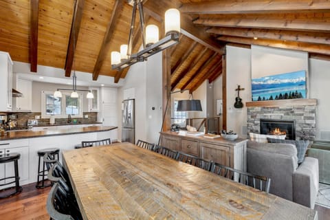 Cozy and open mountain living area with large open windows and plenty of natural lighjt