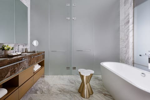 Club Suite, 2 Bedrooms | Bathroom | Separate tub and shower, rainfall showerhead, designer toiletries