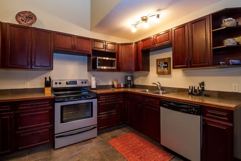 Condo | Private kitchen | Full-size fridge, microwave, oven, stovetop