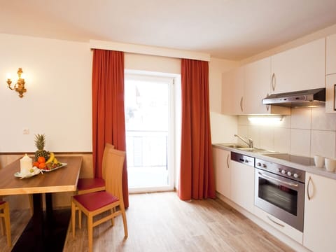 Cabinetry, Window, Wood, Interior Design, Lighting, Curtain, Building, Table, Floor, Countertop