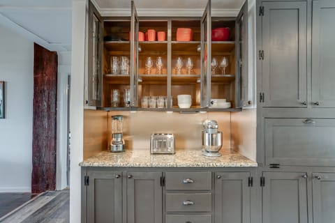 Plentiful dishware and glasses for everyone.