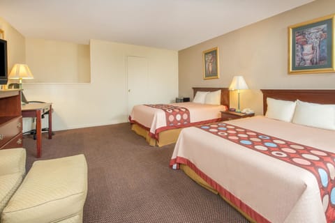 Desk, laptop workspace, blackout drapes, iron/ironing board