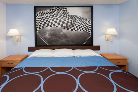 Desk, laptop workspace, blackout drapes, iron/ironing board