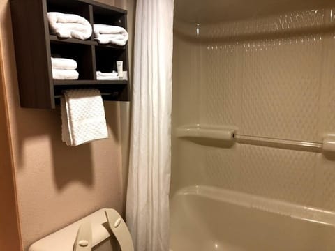 Classic Room, 2 Queen Beds, Smoking | Bathroom | Combined shower/tub, free toiletries, hair dryer, towels