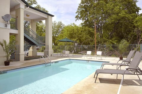 Seasonal outdoor pool, open 10:00 AM to 10:00 PM, sun loungers