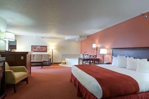 Premier Suite, 1 King Bed, Non Smoking | Down comforters, in-room safe, desk, laptop workspace