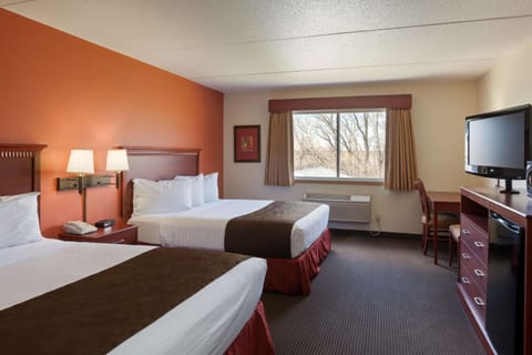 Suite, 2 Double Beds, Non Smoking | Down comforters, in-room safe, desk, laptop workspace