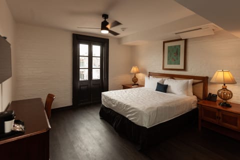 Deluxe Room, 1 King Bed, Balcony | In-room safe, individually decorated, individually furnished