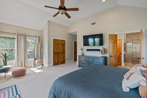 4k TV, Sonos sound and sitting area in this huge primary bedroom