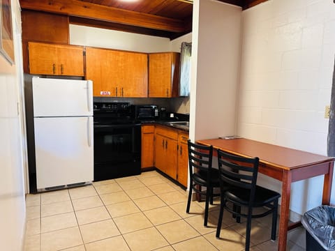 Standard Suite, 1 King Bed, Kitchenette | Private kitchen | Full-size fridge, microwave