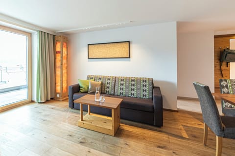 Apartment, 2 Bedrooms, Balcony, Mountain View (App 5) | Living area | Flat-screen TV, toys