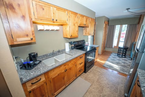 Suite, Multiple Beds (Not Pet Friendly) | Private kitchen | Fridge, microwave, coffee/tea maker