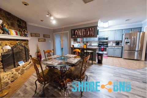 Serving those tasty delicacies was never more accessible as the dining table was next to the kitchen.