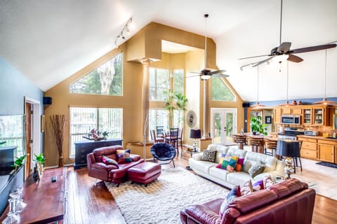 open concept living/dining! on the left is a 65 inch smart TV