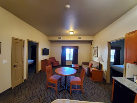 Suite, 2 Queen Beds, Non Smoking, Kitchen | Living area | 43-inch flat-screen TV with cable channels, TV