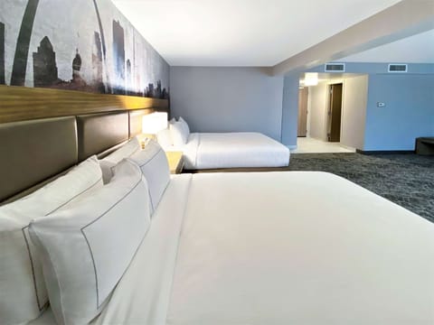 Deluxe Room, 2 Queen Beds, Non Smoking | In-room safe, desk, blackout drapes, iron/ironing board