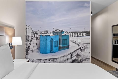 Desk, laptop workspace, blackout drapes, iron/ironing board