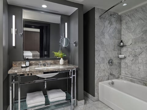 Suite, 1 Bedroom | Bathroom | Combined shower/tub, eco-friendly toiletries, hair dryer, bathrobes