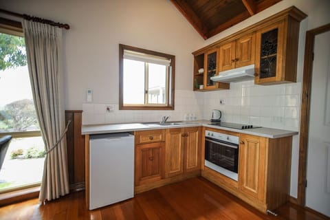 Rose Cottage | Private kitchen | Microwave, toaster, cookware/dishes/utensils, cleaning supplies