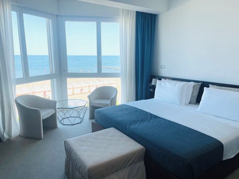 Deluxe Double Room, Sea View | Premium bedding, minibar, in-room safe, desk