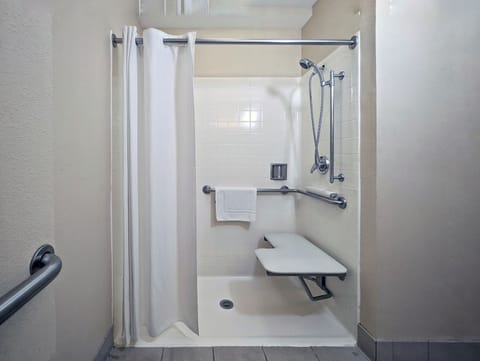 Non-Smoking Handicap King Sized Bedroom | Bathroom | Free toiletries, hair dryer, towels, soap