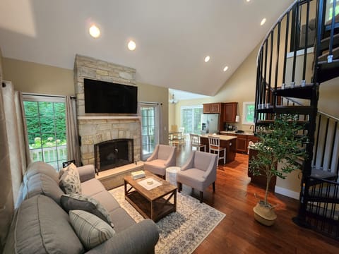 Wood burning fireplace, vaulted ceilings and an open concept floorplan.