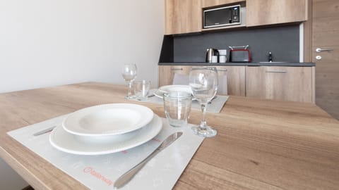 Apartment (1 Bedroom) | Living area | 55-inch flat-screen TV with cable channels, TV