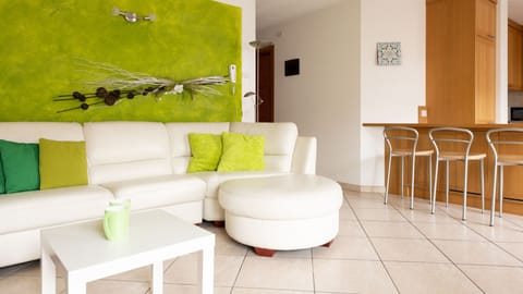 Apartment (2 Bedrooms) | Living area | 24-inch flat-screen TV with cable channels, TV