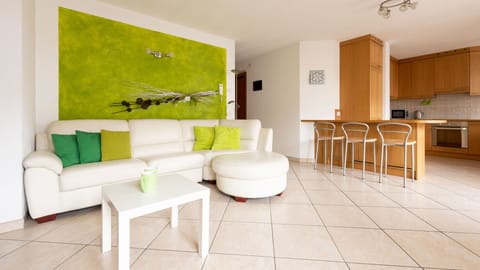 Apartment (2 Bedrooms) | Living area | 24-inch flat-screen TV with cable channels, TV