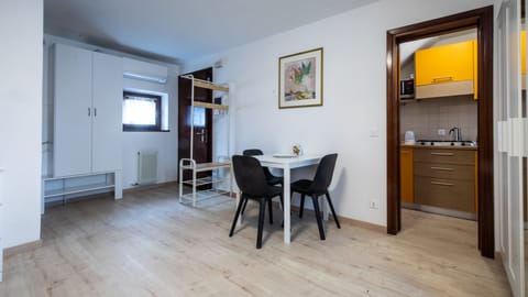 Family Studio (0 Bedroom) | Living area | 24-inch flat-screen TV with cable channels, TV