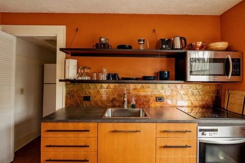 Refrigerator, pantry and extra everything to the left.
