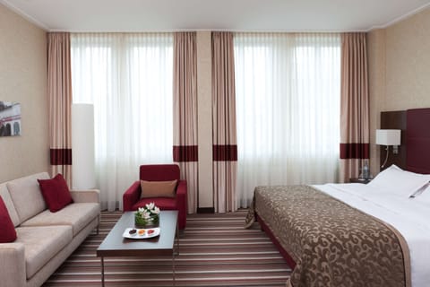 Deluxe Room | Premium bedding, minibar, in-room safe, individually decorated