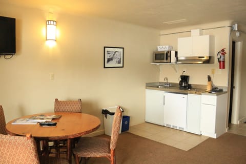 Suite, 2 Bedrooms | Private kitchen | Mini-fridge, microwave, coffee/tea maker