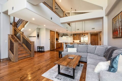 Spacious living room with 77 inch TV