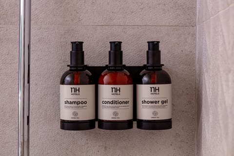 Combined shower/tub, eco-friendly toiletries, hair dryer, towels