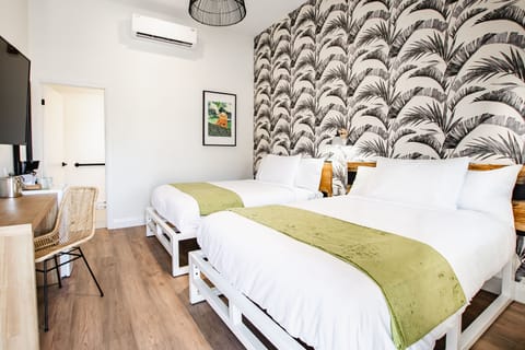 Basic Room, 2 Double Beds | In-room safe, individually decorated, iron/ironing board, free WiFi
