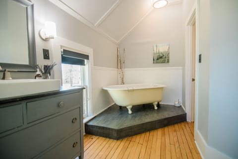 Mahaney Suite | Bathroom | Hair dryer, bathrobes, towels