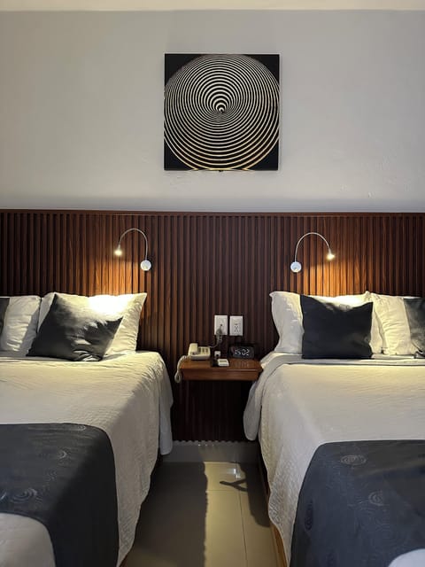 Deluxe Room, 2 Double Beds | Down comforters, memory foam beds, desk, laptop workspace